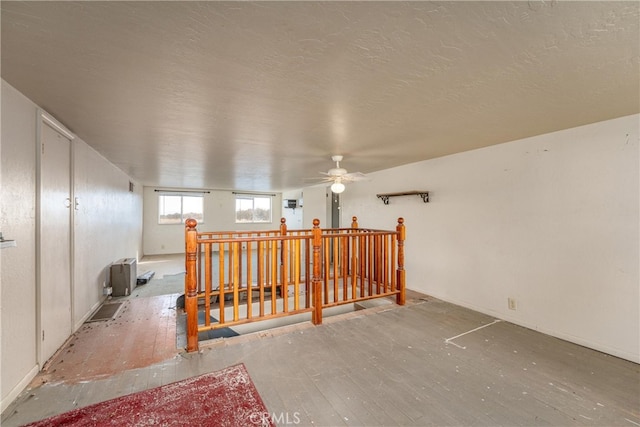 interior space featuring ceiling fan and hardwood / wood-style floors