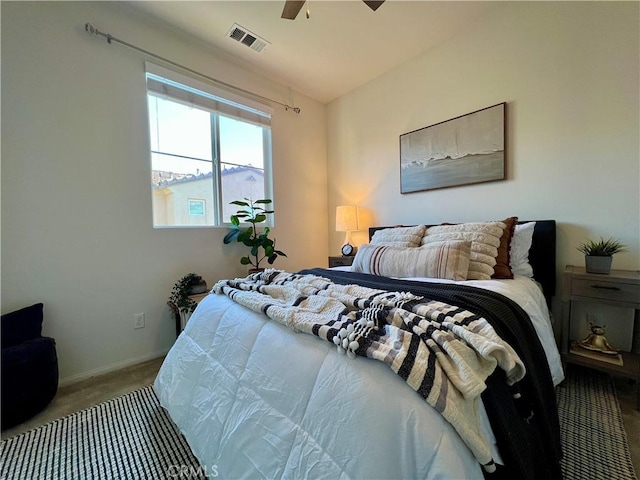 bedroom with ceiling fan and carpet