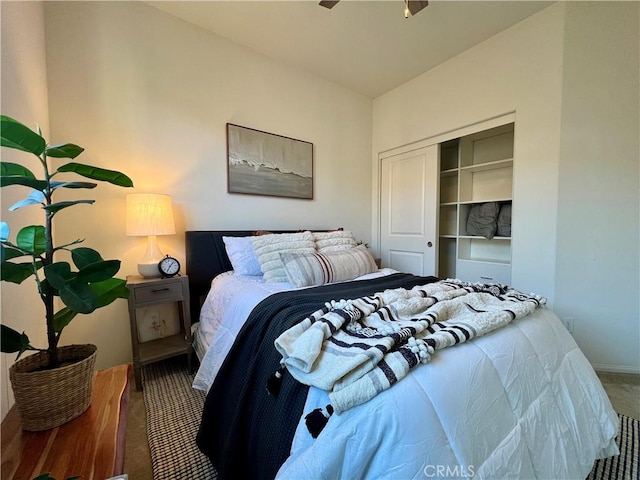 carpeted bedroom with a closet