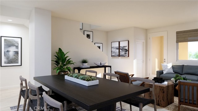 dining space featuring recessed lighting and baseboards