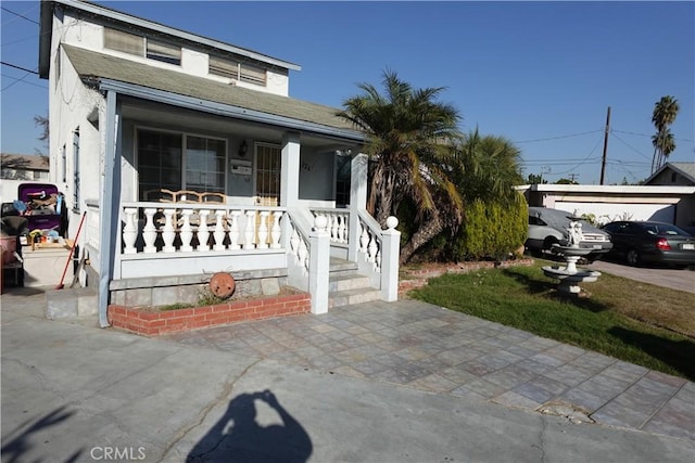 view of front of house featuring covered porch