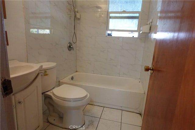 full bathroom with toilet, vanity, tile patterned floors, and tiled shower / bath