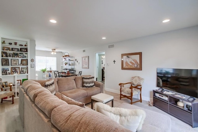 living room with ceiling fan