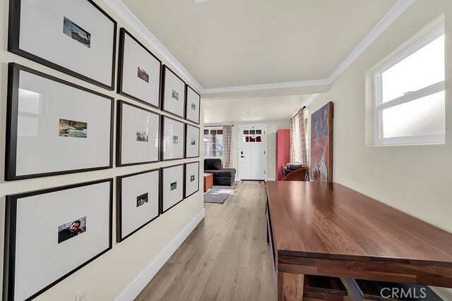 hallway with light hardwood / wood-style flooring