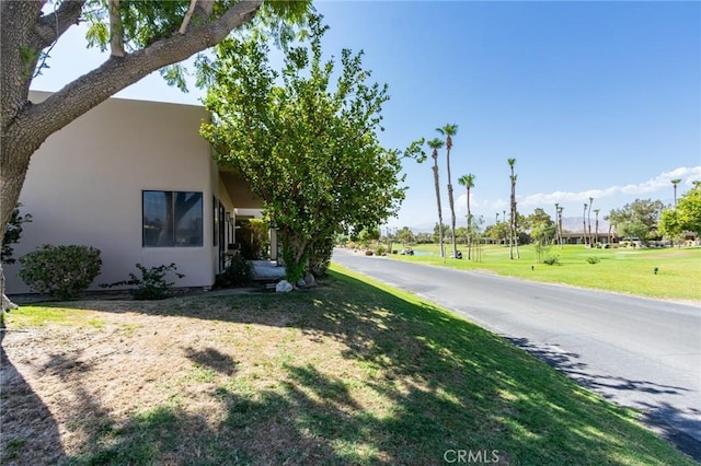 exterior space with a yard