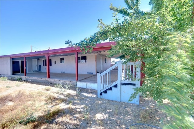 view of front of property with a patio area