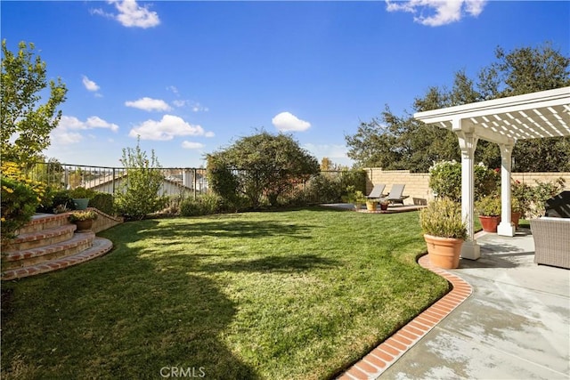 view of yard featuring a pergola and a patio