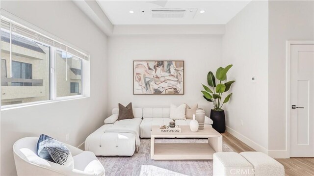 living room with light hardwood / wood-style floors