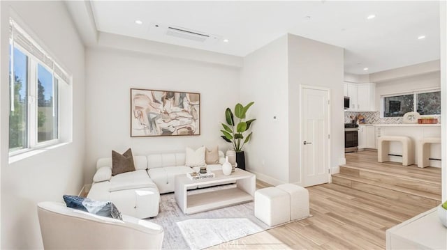 living room with light wood-type flooring