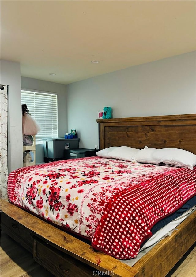 bedroom featuring light hardwood / wood-style flooring