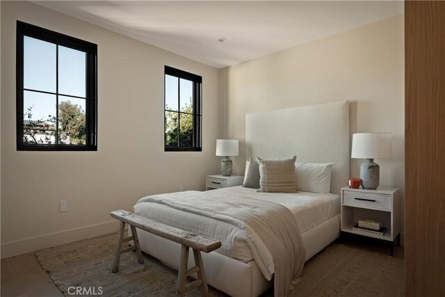 bedroom with hardwood / wood-style flooring