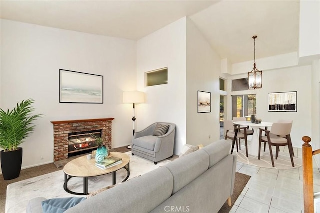 1520 W Norwood St, Rialto, CA 92377 - living room featuring a fireplace and a chandelier
