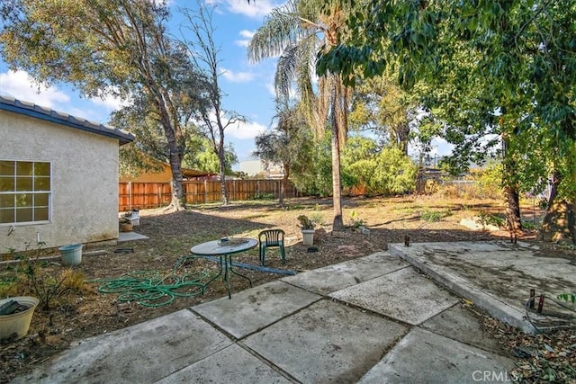 1520 W Norwood St, Rialto, CA 92377 - view of yard with a fenced backyard and a patio area