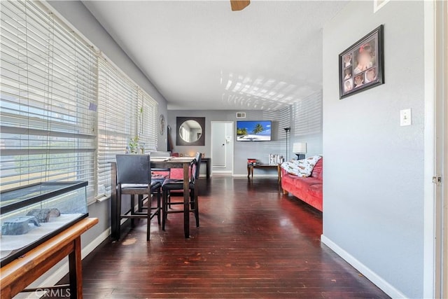 dining room featuring dark hardwood / wood-style flooring