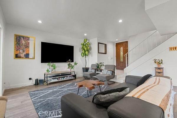 living room with light hardwood / wood-style floors