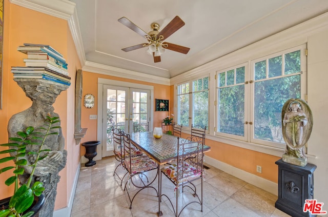 sunroom with ceiling fan and french doors