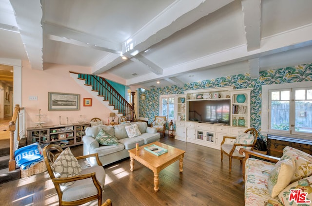 living room with hardwood / wood-style floors, vaulted ceiling with beams, and french doors