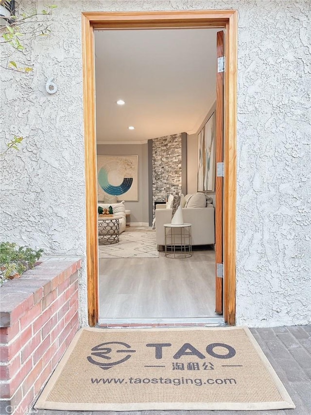 doorway to property featuring a patio