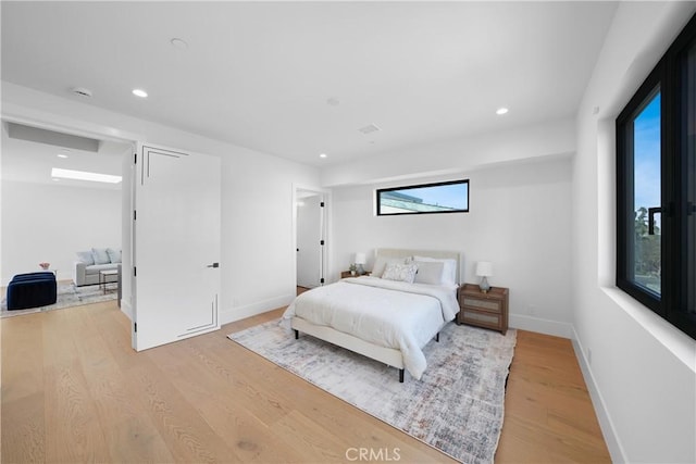 bedroom featuring light wood-type flooring