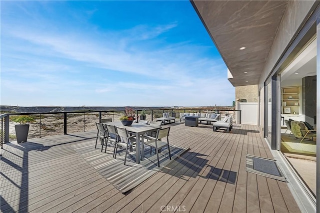 wooden terrace featuring an outdoor living space