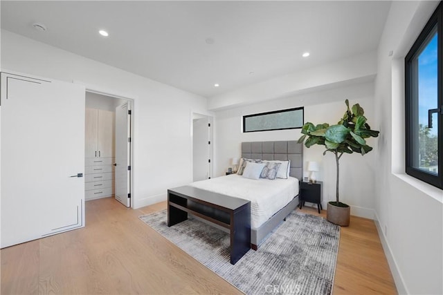 bedroom featuring light hardwood / wood-style floors