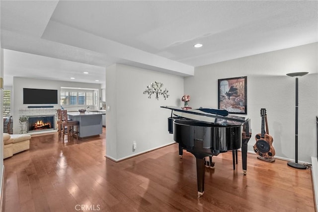 misc room featuring hardwood / wood-style flooring and a textured ceiling