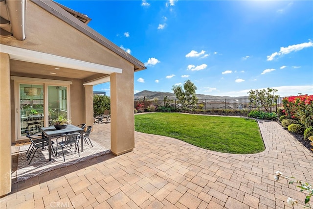 view of patio featuring a mountain view