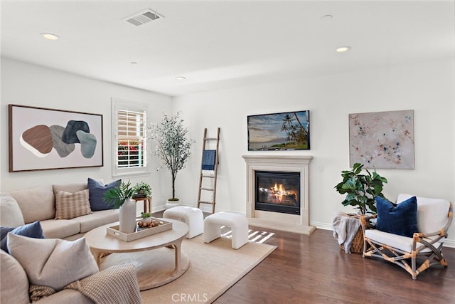 living room featuring dark hardwood / wood-style flooring