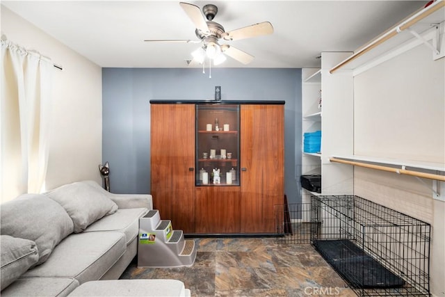 living room with ceiling fan