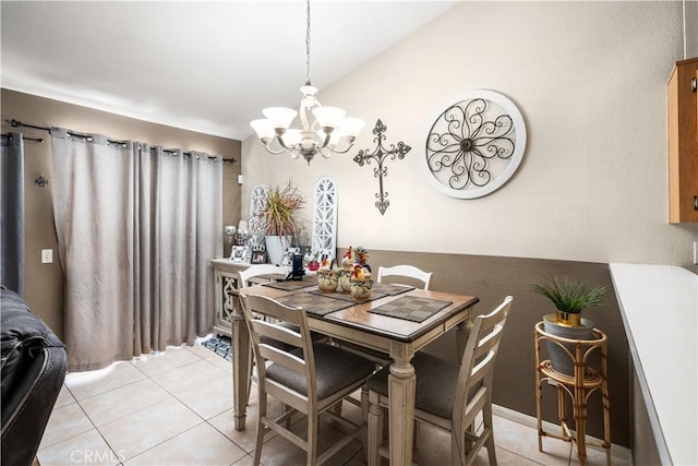 tiled dining area with a notable chandelier