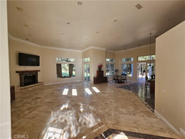 living room featuring french doors and ornamental molding