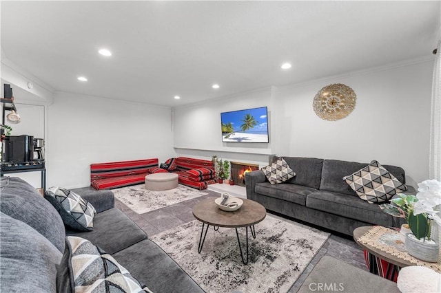 living room featuring crown molding