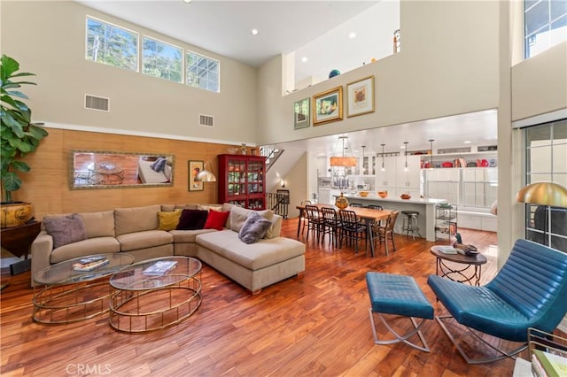 2355 N Beverly Glen Blvd, Los Angeles, CA 90077 - living area featuring a towering ceiling, wood finished floors, and recessed lighting