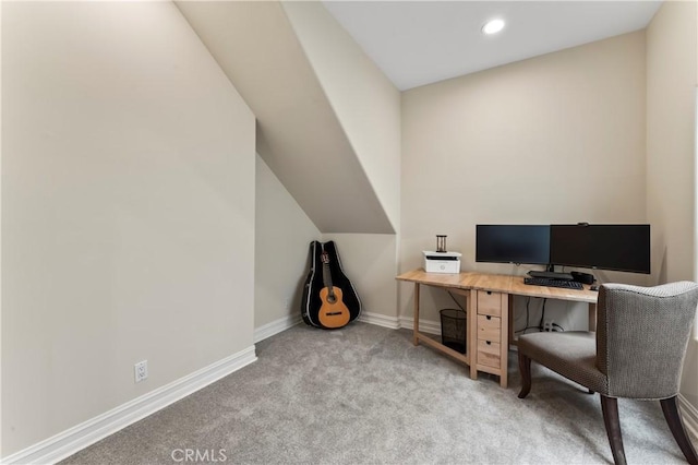 office area featuring light carpet