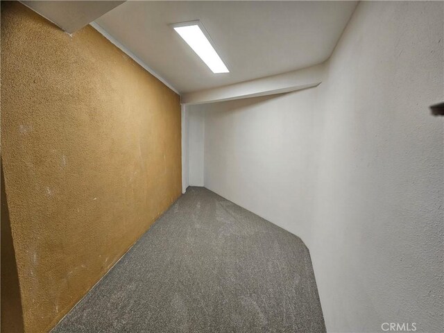 2355 N Beverly Glen Blvd, Los Angeles, CA 90077 - finished below grade area with carpet flooring and a textured wall
