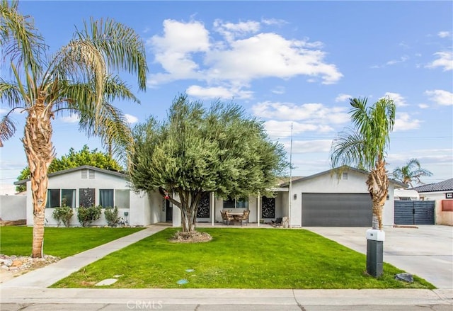 ranch-style home with a front yard and a garage