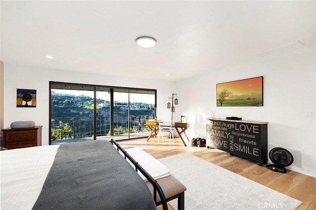 bedroom featuring wood-type flooring