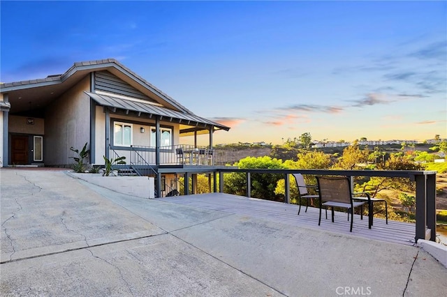 view of property exterior at dusk