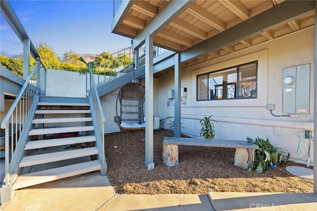 entrance to property with a balcony