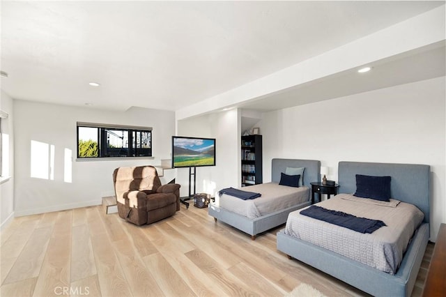 bedroom with light wood-type flooring