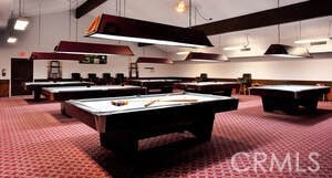 playroom with carpet, high vaulted ceiling, beam ceiling, and pool table