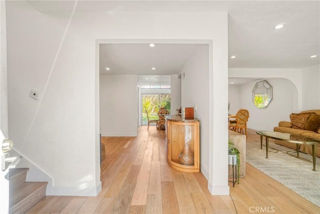 hallway with light wood-type flooring