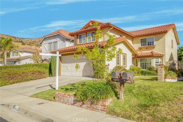 mediterranean / spanish-style house with a garage and a front lawn