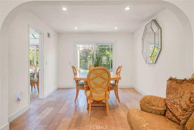 dining room with light wood-type flooring