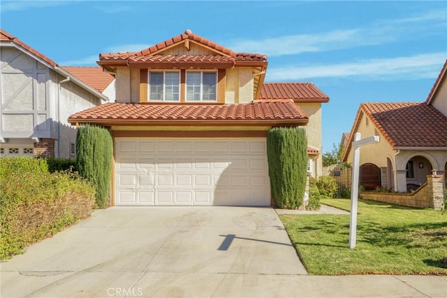 mediterranean / spanish-style house with a front lawn and a garage