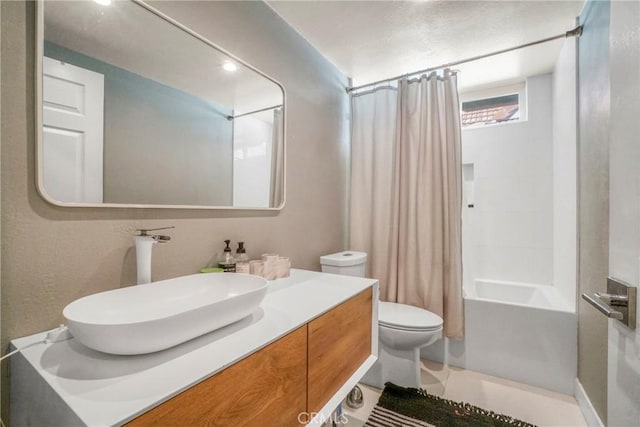 full bathroom with vanity, shower / bathtub combination with curtain, and toilet