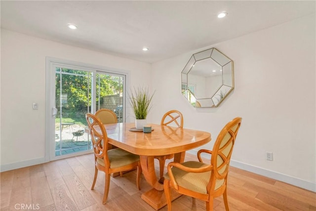 dining room featuring light hardwood / wood-style floors