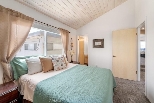 bedroom featuring ensuite bath, carpet, wooden ceiling, and lofted ceiling