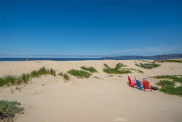 property view of water with a beach view