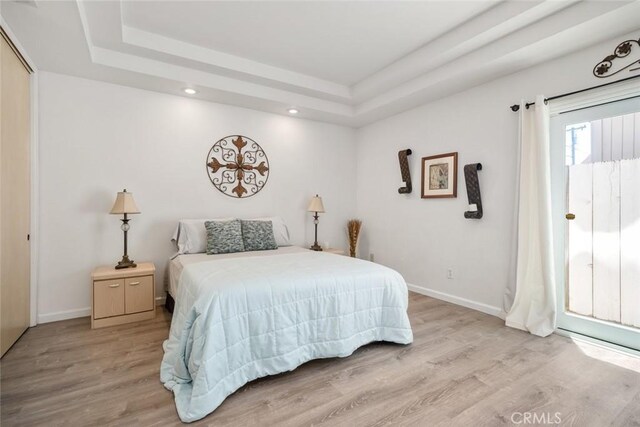 1652 Strand Way, Oceano, CA 93445 - bedroom with a raised ceiling, wood finished floors, and recessed lighting